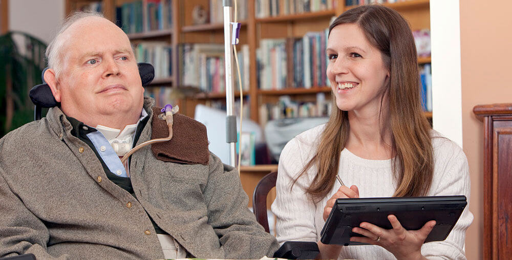 woman with datapad next to man with IV